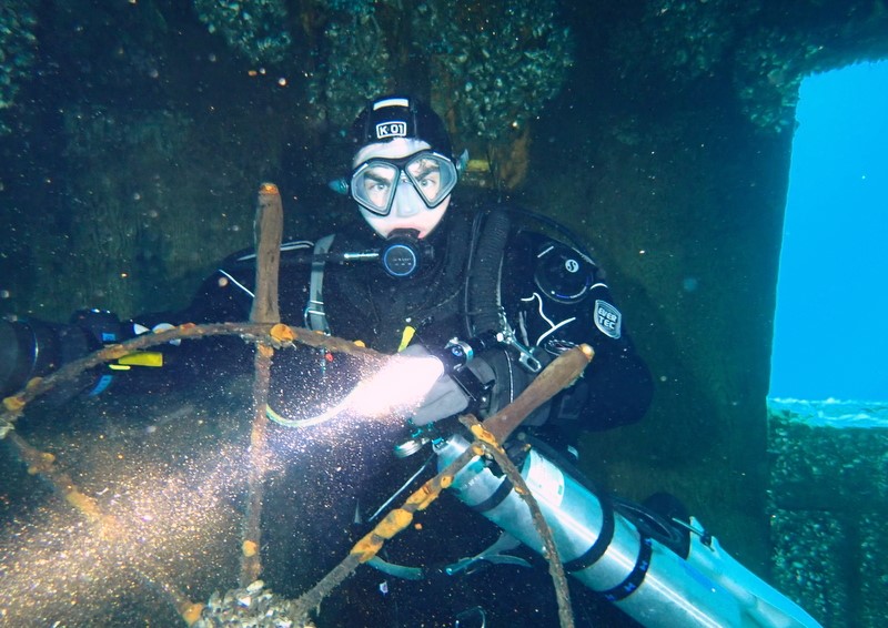 Portrait photograph W. Skelly impersonating a fish